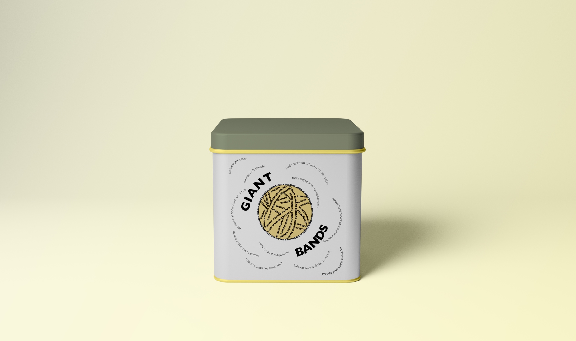 White Giant Rubber Bands tin with olive lid, yellow trim, and circular typography centered around a coiled rubber band graphic.